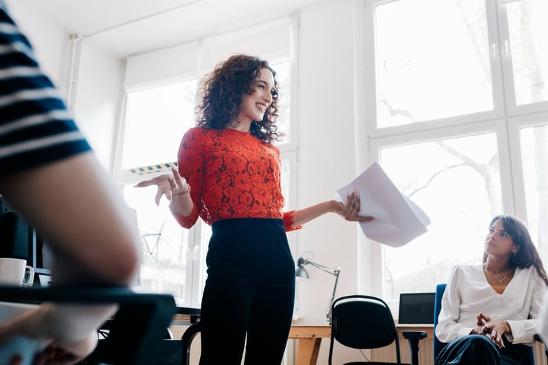 woman-speaking-on-a-meeting-1