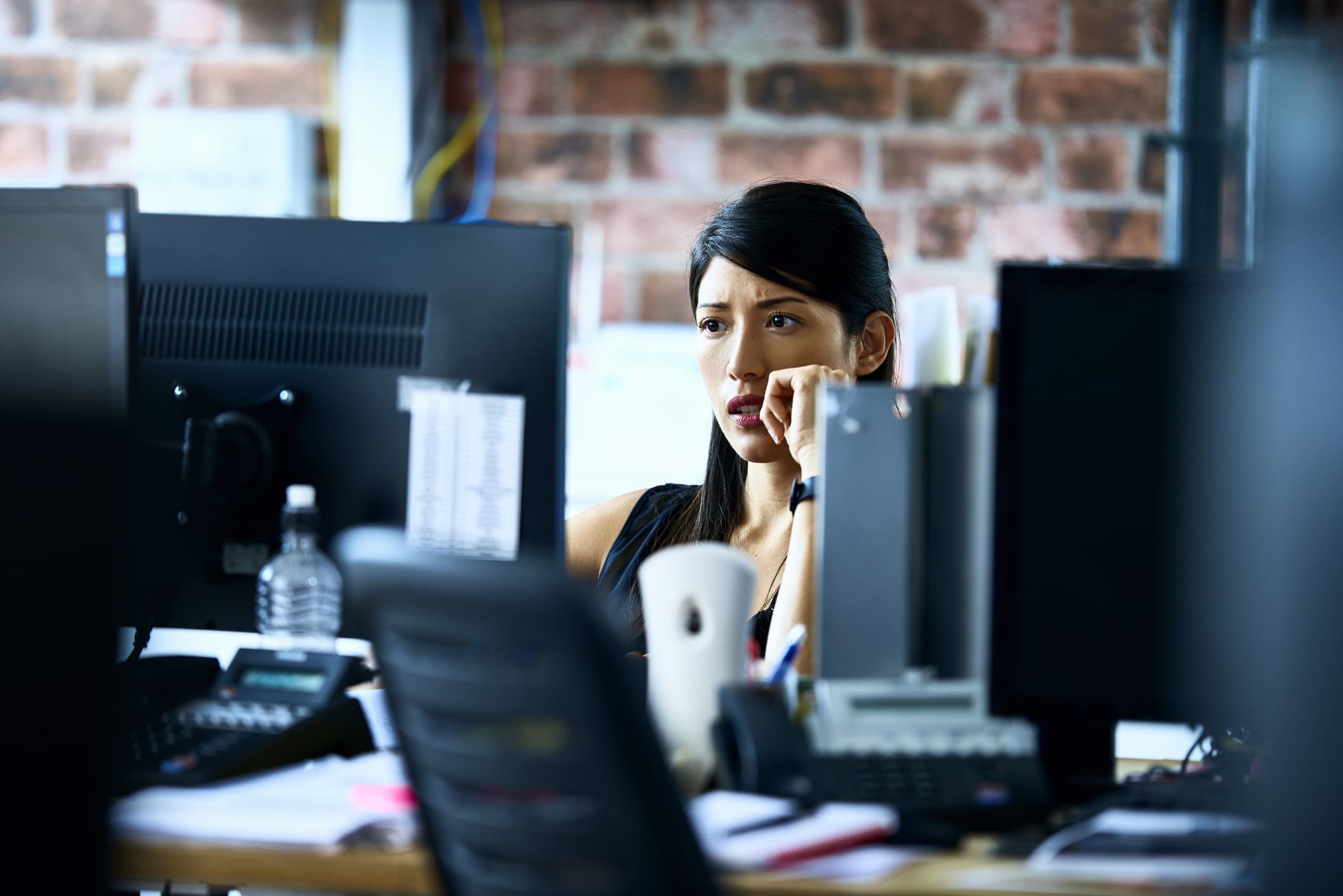 woman-worried-on-her-desk