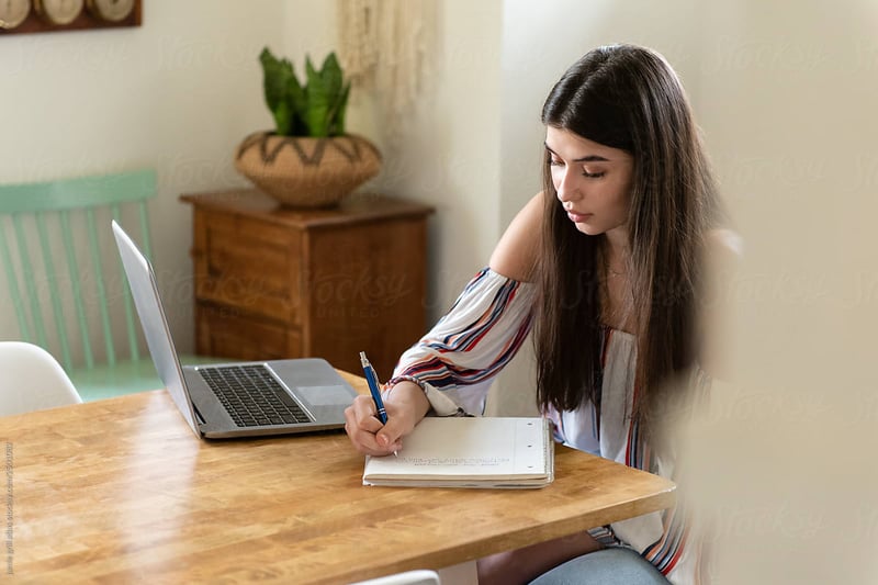 woman-writing-notepad-digital-coaching