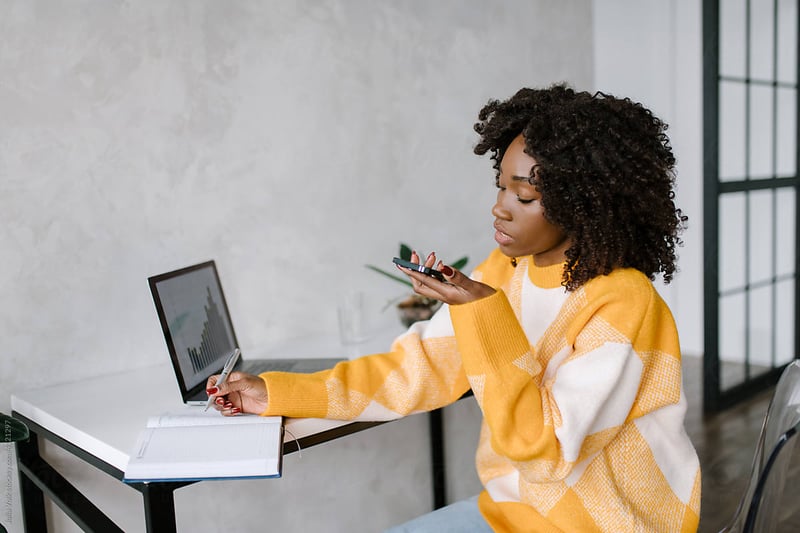 woman-writing-on-phone-middle-management