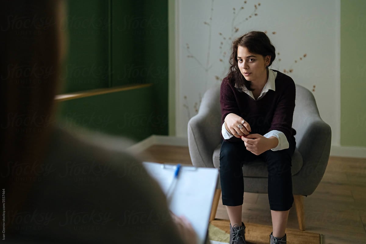 women-seated-talking-coaching-types