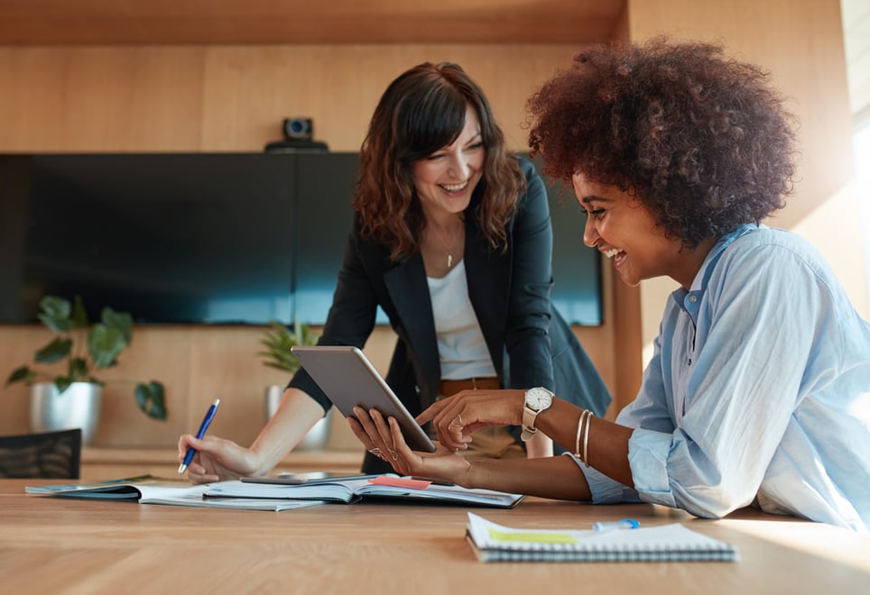 women-working-and-smiling-how-to-get-over-embarrassment