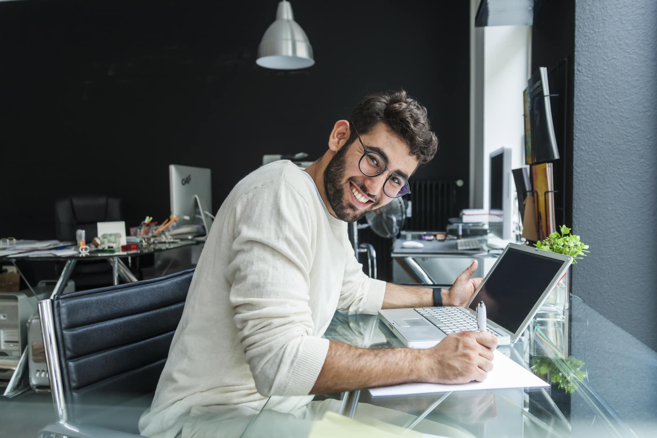 young-man-studying-on-his-laptop-apprentice-vs-intern