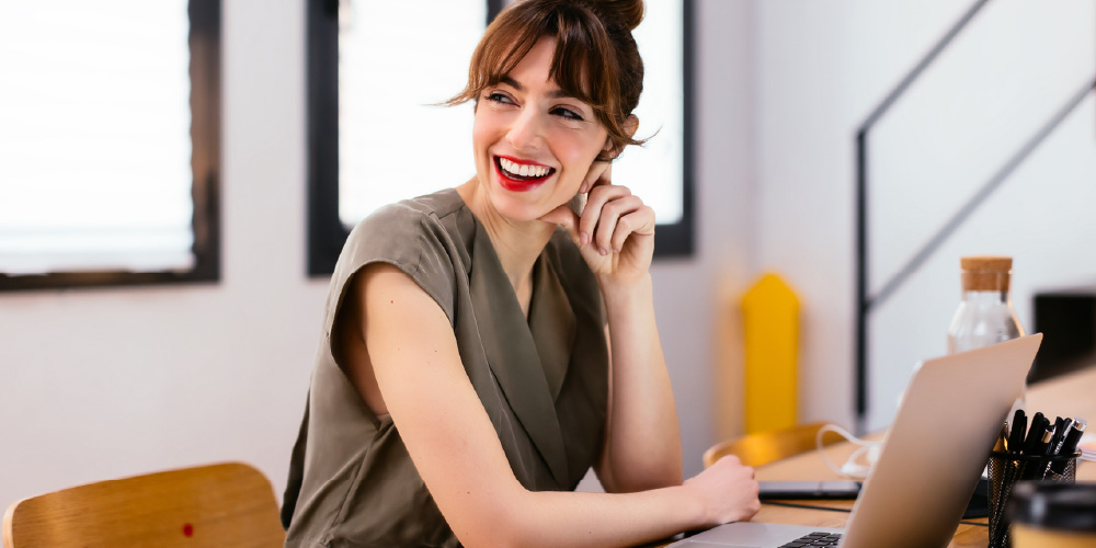 woman-laughing-take-control-of-work-for-well-being