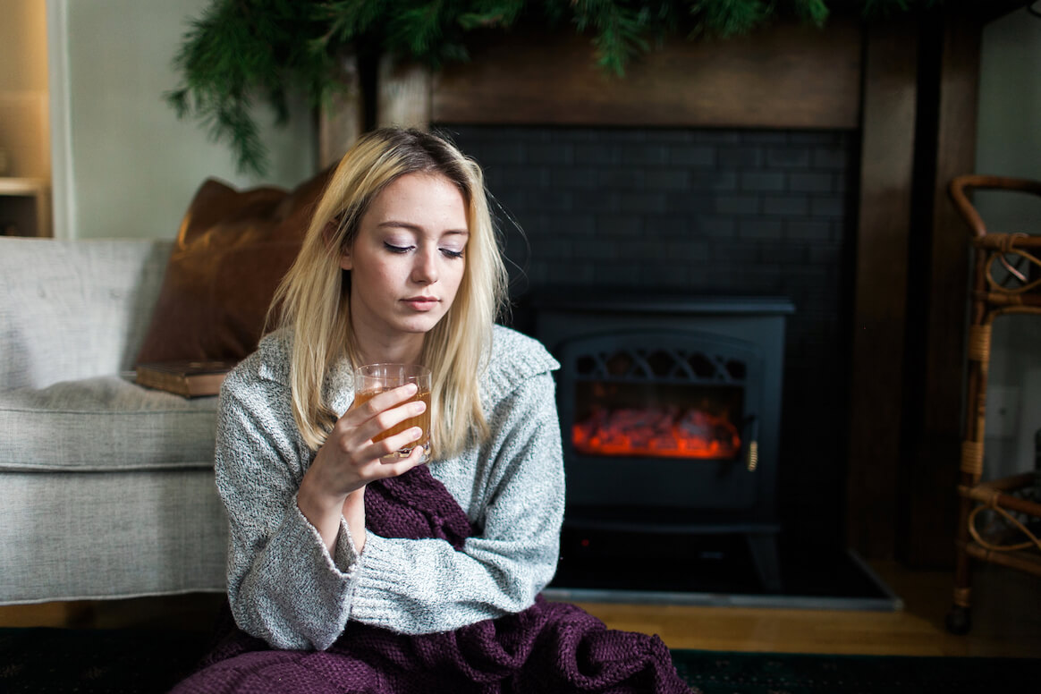 holiday-stress-person-sipping-a-cocktail