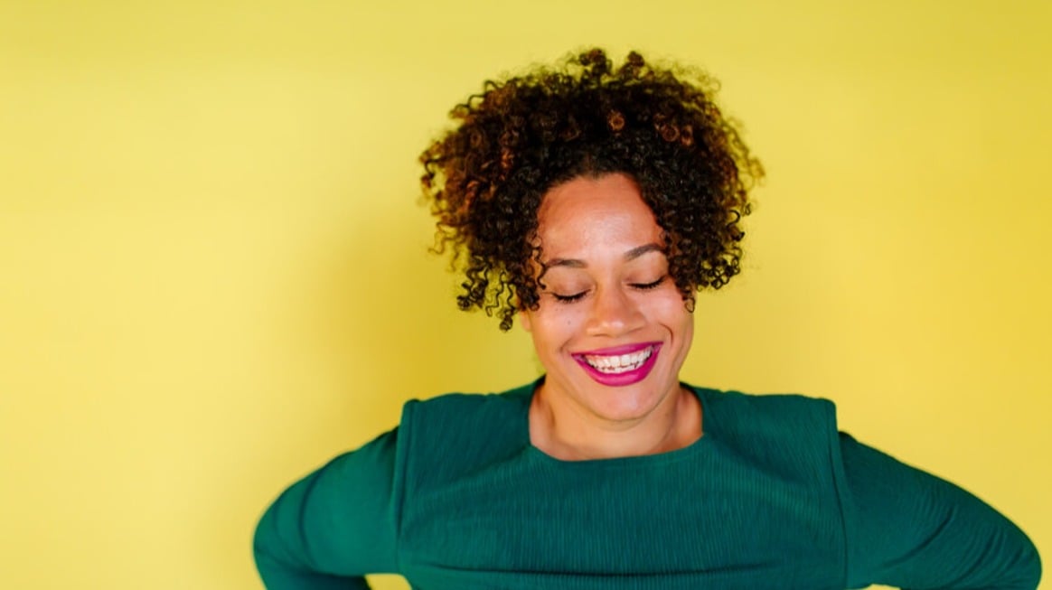 woman-smiling-with-eyes-closed-mind-body-and-soul-1